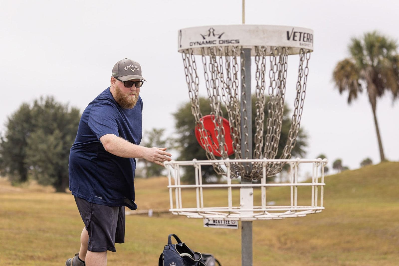 A putt drops into the chains of a white basket at Majette.